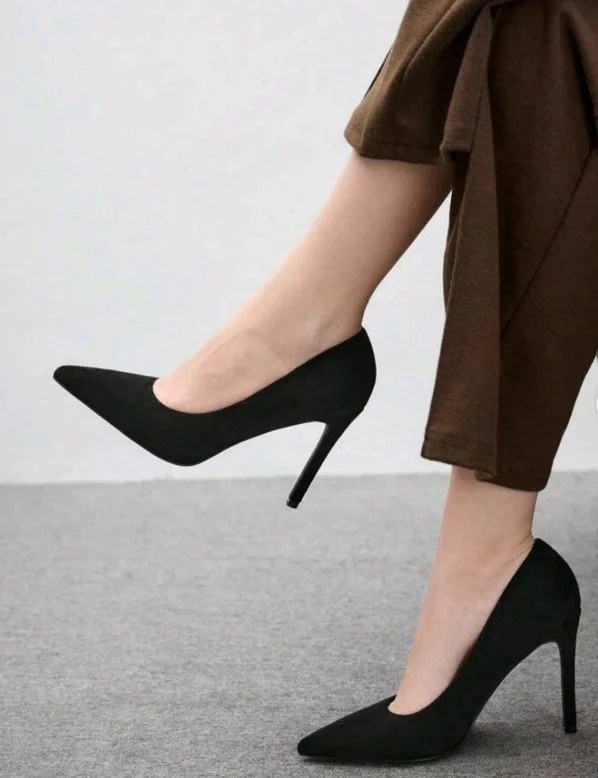 Black heels with a dark brown dress for an elegant look
