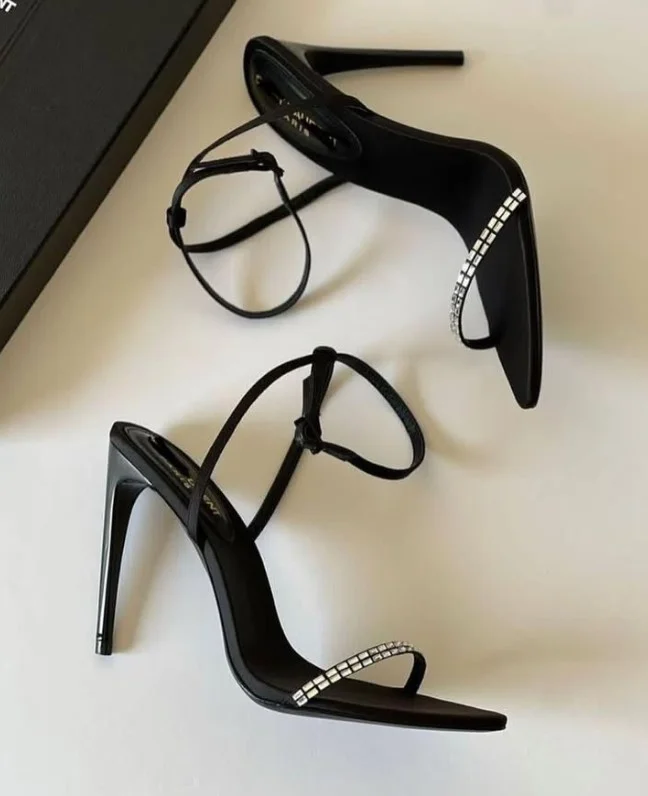 Black heels paired with a forest green dress
