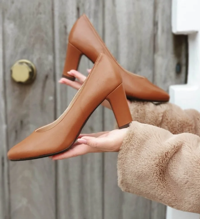 Cognac heels with a green midi dress