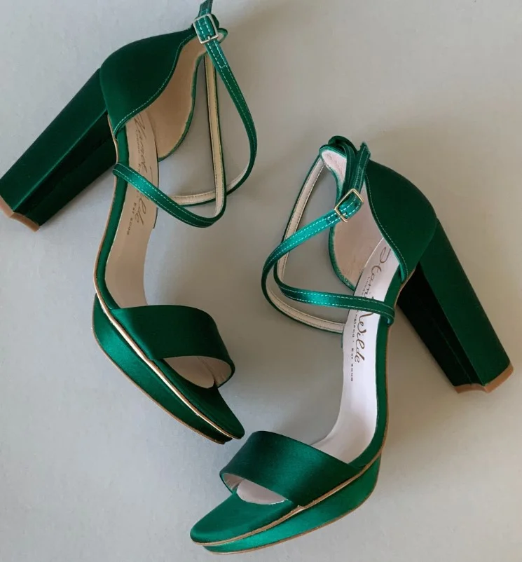 Forest green heels paired with an emerald green dress