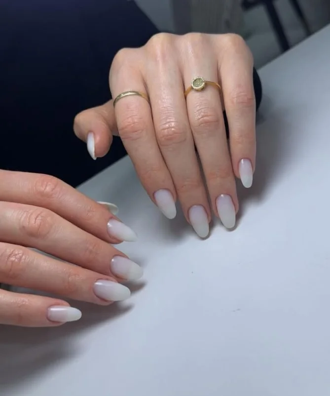 Milky white manicure with a purple formal dress