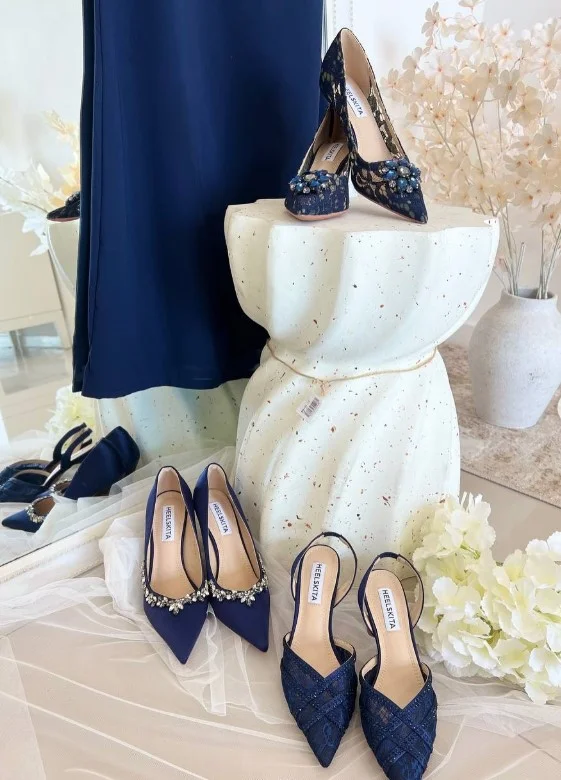 Navy heels with a matching navy dress for a monochrome outfit