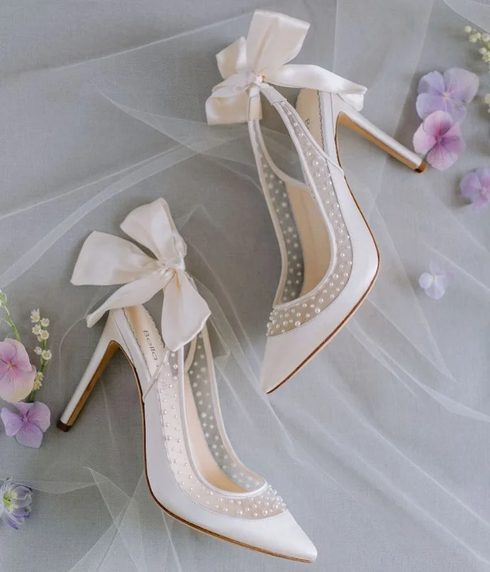Pearl ivory heels styled with a green formal dress