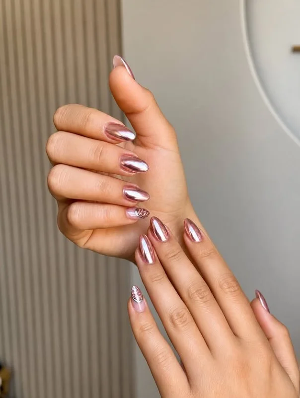 Rose gold nails matching a purple formal outfit