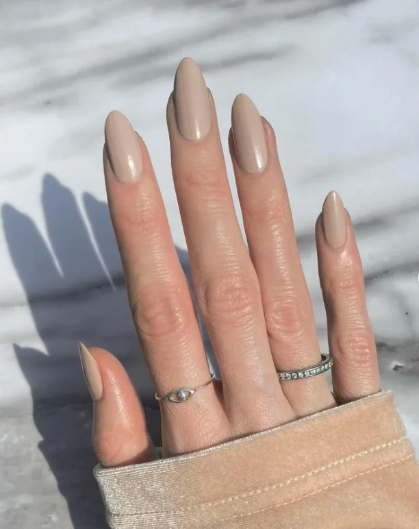 Taupe beige manicure for a purple dress look
