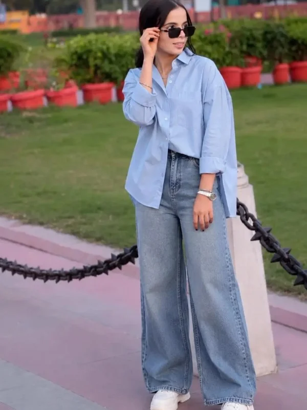 Blue button down shirt with wide-leg jeans