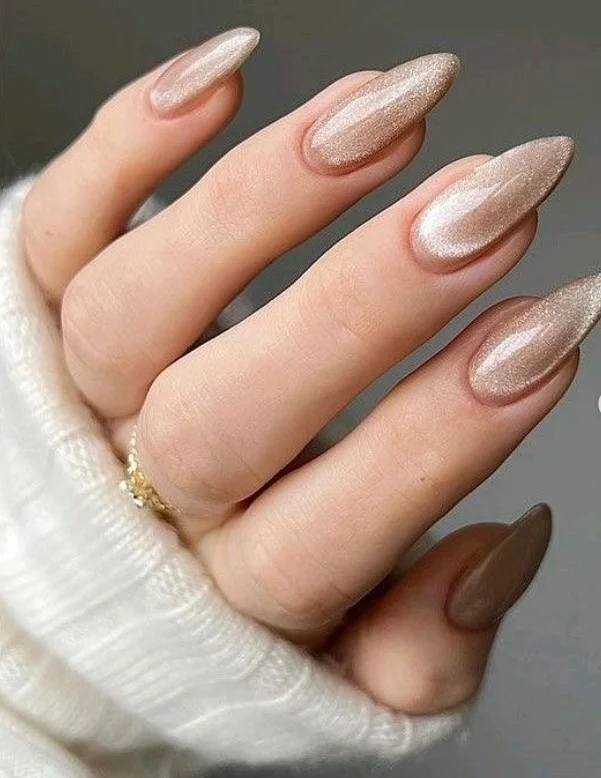 Champagne shimmer nail polish for weddings and special occasions.