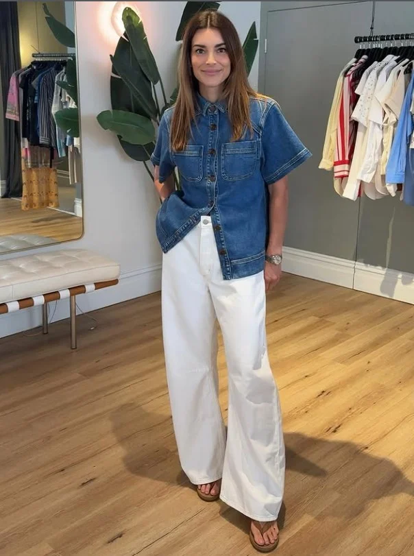 Denim button down shirt with white jeans and brown leather accessories