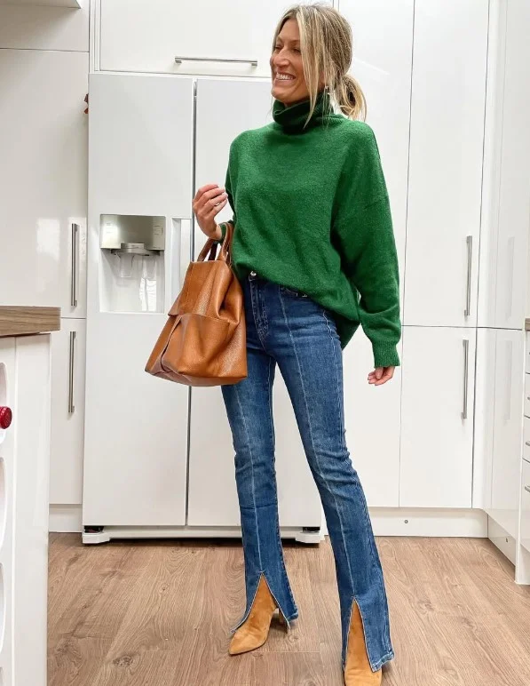 Flare jeans with heeled boots and fitted knit top