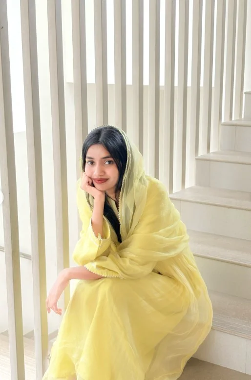 Golden yellow summer dress enhancing naturally warm skin tone.