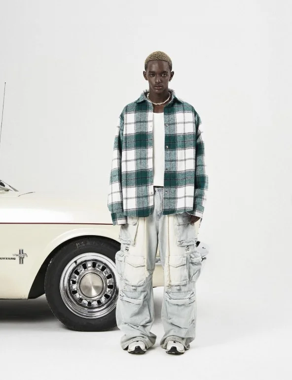 Men’s green flannel styled with casual cargo pants