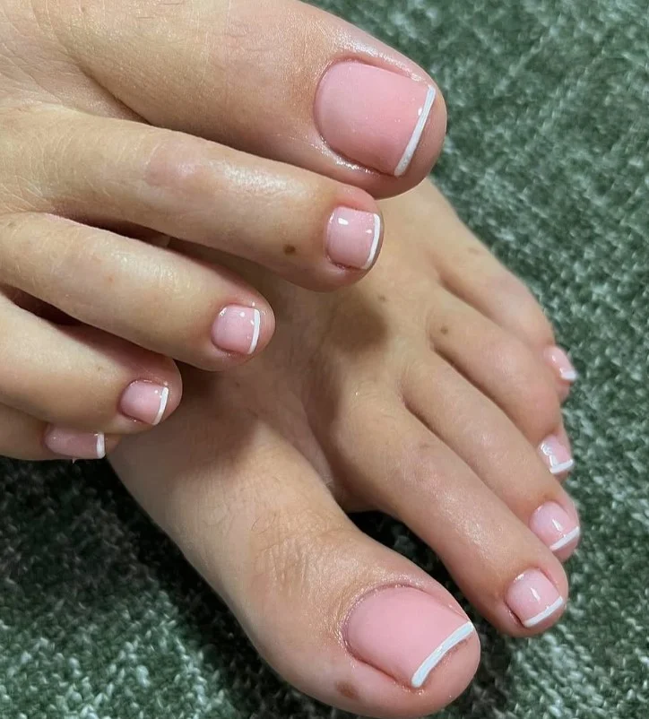 Micro French tip toenails with delicate white tips