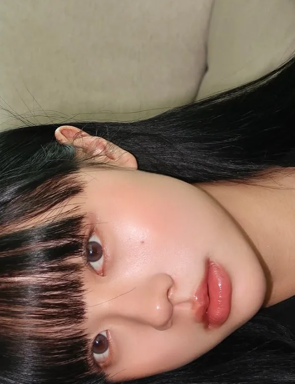 Rosy beige lipstick for a polished office-ready makeup look.