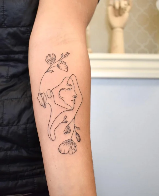 Upper forearm tattoo women continuous-line face tattoo