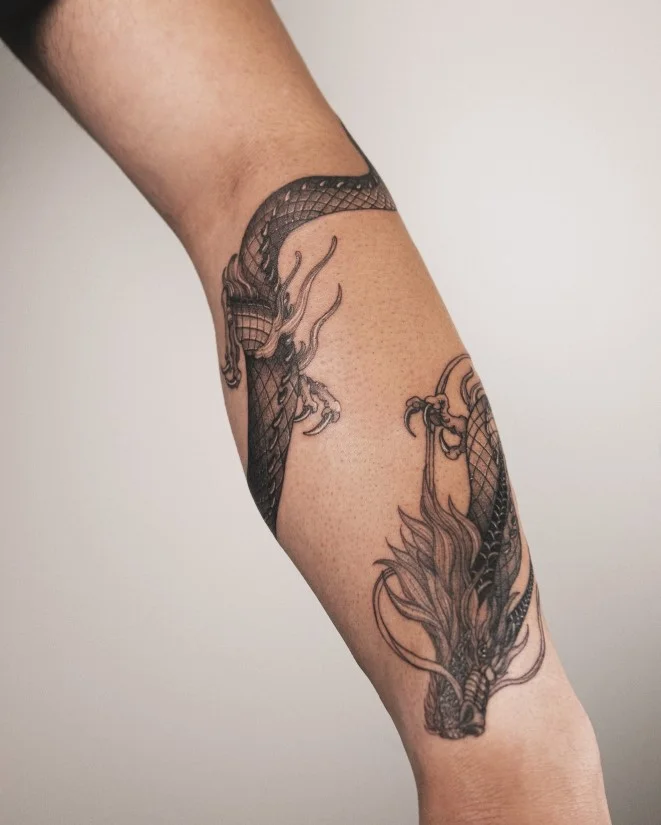 Illustrative dragon with a long curved body wrapping around a woman's forearm