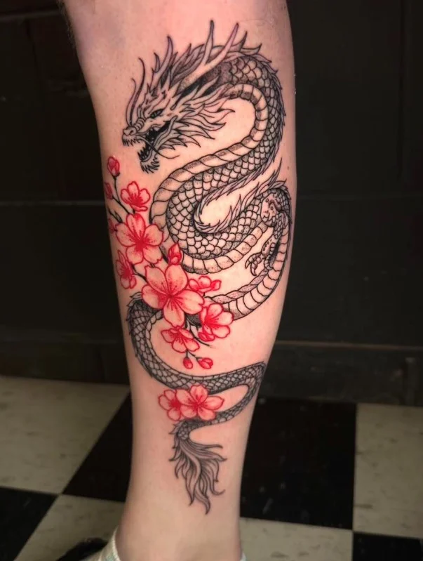 Japanese-inspired dragon flowing down a woman's lower leg