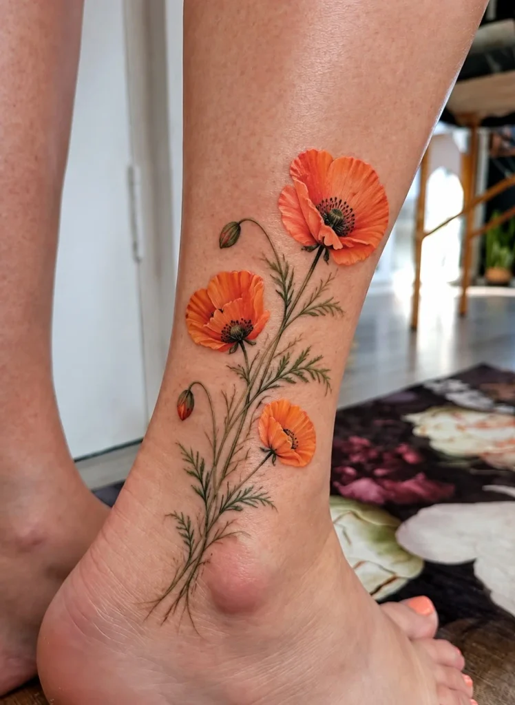 Poppy flowers growing from the ankle into a lower leg tattoo for women