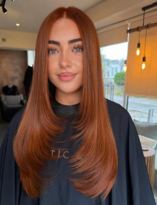 Classic auburn hair featuring rich red-brown tones and natural-looking dimension.