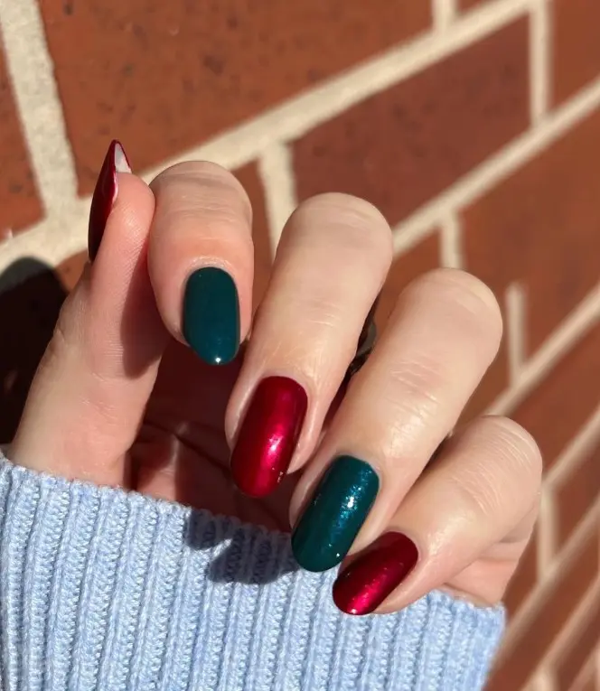 Classic red and green Christmas nails with alternating glossy red and green polish