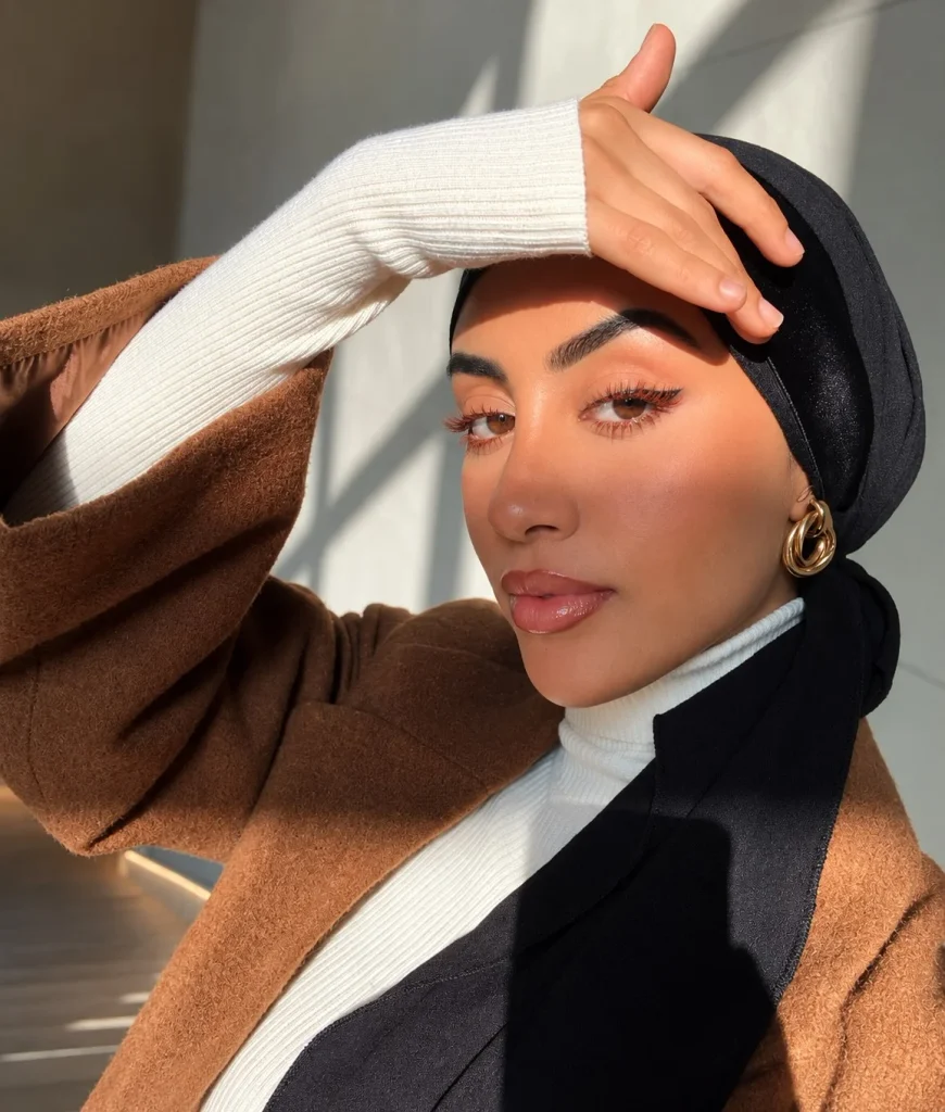 Woman with brown eyes wearing copper mascara for a rich warm-toned lash look