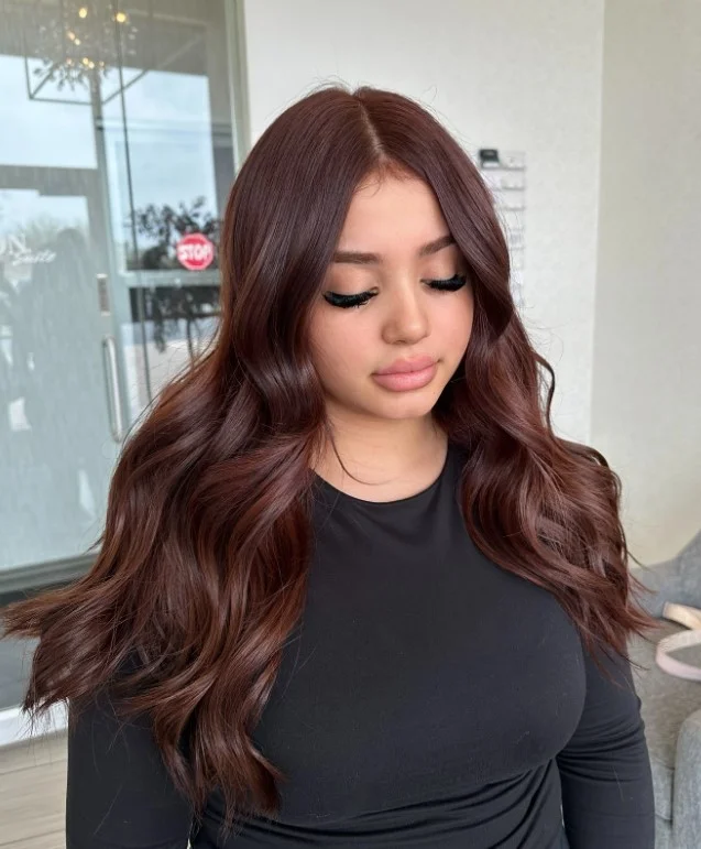 Dark copper brown hair color for light olive skin with a rich brunette base and subtle copper highlights.