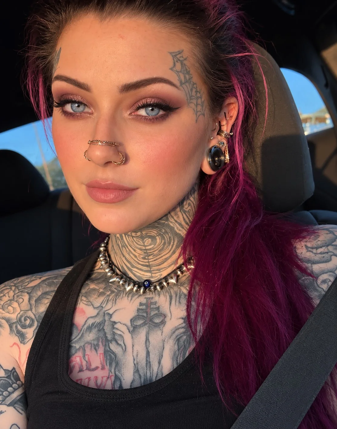 Blue eyes wearing dusty mauve eyeshadow on the lids with soft brown shading around the outer corners.