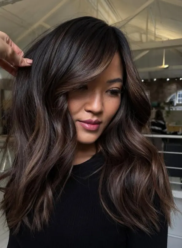 Subtle espresso brown highlights in nearly black hair