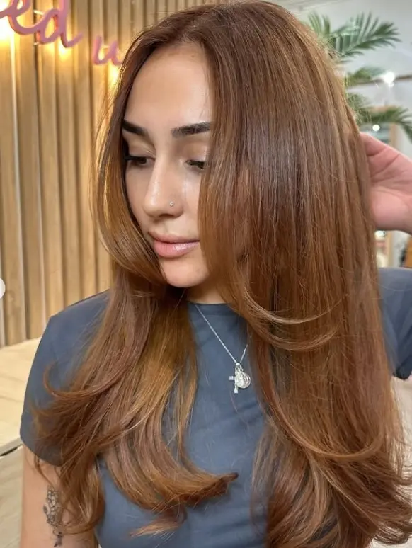 Golden brown hair with an even, warm finish from roots to ends.