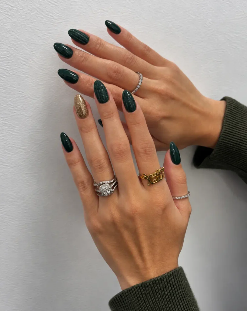 Green Christmas sweater nails with raised cable-knit patterns and a subtle gold shimmer accent