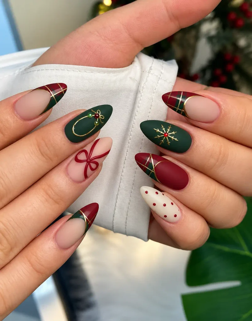 Matte red and forest green Christmas nails with a smooth, non-glossy finish