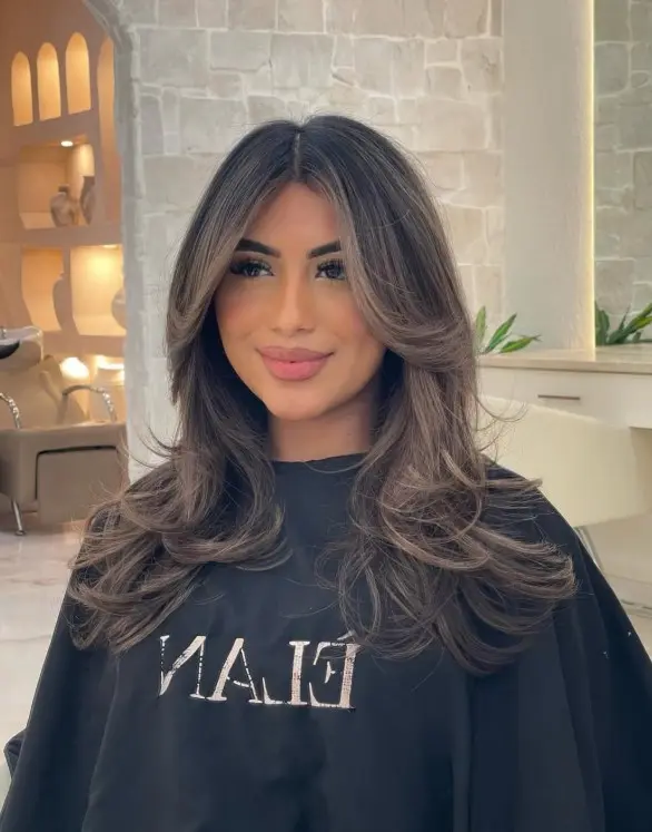 Mushroom brown hair with cool taupe and ash-brown tones.