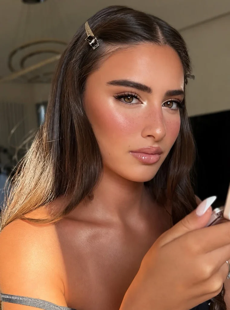 Pink-beige nude lipstick shade with a soft rosy undertone for a natural everyday makeup look.