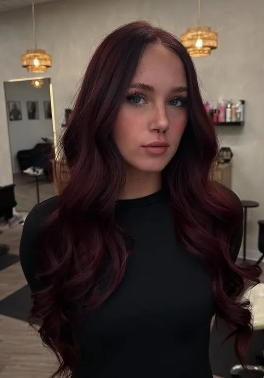 Dark roots blended seamlessly into rich mahogany red-brown lengths.