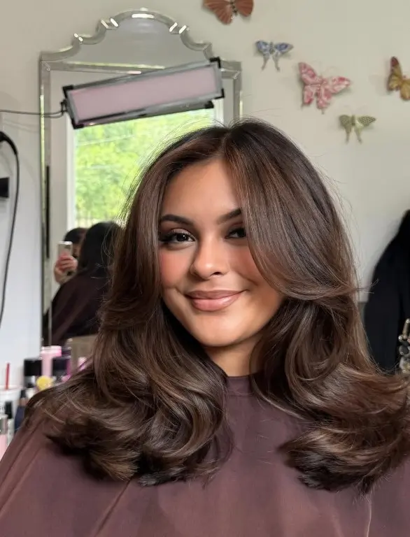 Rich espresso brown shoulder-length hair with a smooth, glossy finish