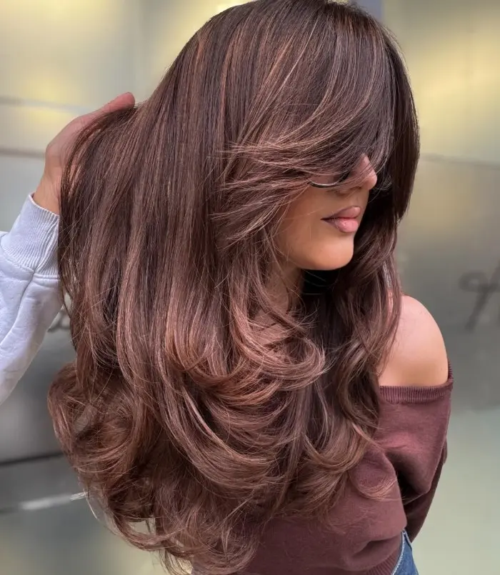 Rose brown hair with subtle muted pink undertones.